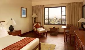 Ένα ή περισσότερα κρεβάτια σε δωμάτιο στο Hyatt Regency Kathmandu