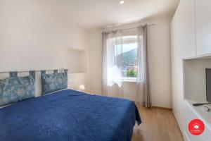 A bed or beds in a room at BUENA VIDA