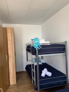 Ένα ή περισσότερα κρεβάτια σε δωμάτιο στο CASA TEO