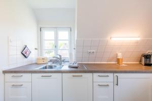 Küche/Küchenzeile in der Unterkunft Haderslebener Str 28