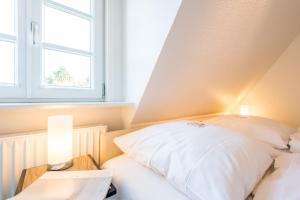 Ein Bett oder Betten in einem Zimmer der Unterkunft Haderslebener Str 28
