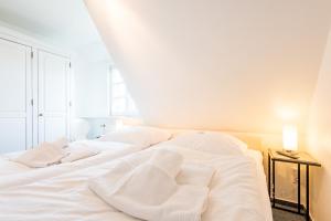 Ein Bett oder Betten in einem Zimmer der Unterkunft Haderslebener Str 28