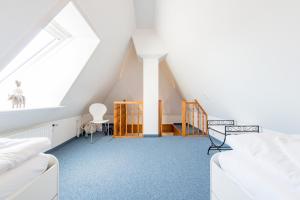 Ein Bett oder Betten in einem Zimmer der Unterkunft Haderslebener Str 28