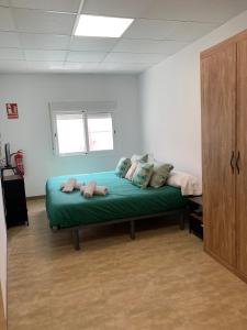 Ένα ή περισσότερα κρεβάτια σε δωμάτιο στο CASA TEO
