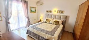 Posteľ alebo postele v izbe v ubytovaní Avalena Penthouse