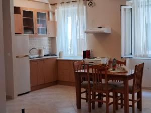 Kuchyň nebo kuchyňský kout v ubytování ML Saroko Apartment