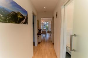 a hallway of a home with a painting on the wall at Apartment Bungalow Sekirn in Sekirn