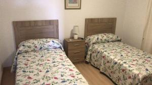 Posteľ alebo postele v izbe v ubytovaní APARTAMENTOS SOL ANDALUZ - GOYA