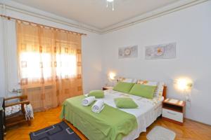 Ein Bett oder Betten in einem Zimmer der Unterkunft Apartment Silvio 1779