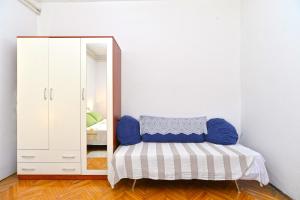 Ein Bett oder Betten in einem Zimmer der Unterkunft Apartment Silvio 1779