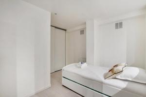 Cama o camas de una habitación en Spacieux appartement aux portes de Paris !