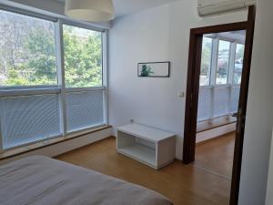 Postel nebo postele na pokoji v ubytování Апартаменти Кабакум Морски бриз на крачки от плажа
