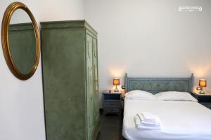 Postel nebo postele na pokoji v ubytování Jazz Hotel