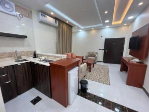 Kuchyň nebo kuchyňský kout v ubytování هاوس إن House Inn