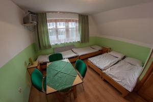 Postel nebo postele na pokoji v ubytování Dom Wczasowy Jesionkówka