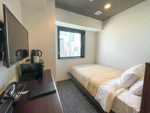 TV o dispositivi per l'intrattenimento presso HOTEL LiVEMAX BUDGET Nagoya Shinkansen-guchi