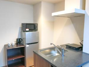 Kuchyň nebo kuchyňský kout v ubytování HOTEL LiVEMAX BUDGET Nagoya Shinkansen-guchi