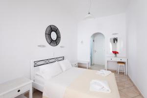Postel nebo postele na pokoji v ubytování Eleftheria Hotel & Apartments