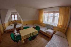 Postel nebo postele na pokoji v ubytování Dom Wczasowy Jesionkówka + 25 fotografií