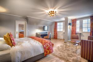 Postel nebo postele na pokoji v ubytování Parkhotel Adler