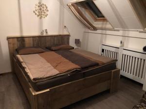 Postel nebo postele na pokoji v ubytování Hotel Pieter de Coninck
