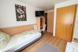 Łóżko lub łóżka w pokoju w obiekcie Gästezimmer Ilse Brauneis