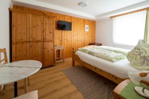 Łóżko lub łóżka w pokoju w obiekcie Gästezimmer Ilse Brauneis