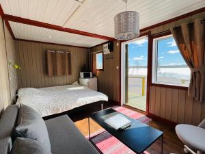 Ένα ή περισσότερα κρεβάτια σε δωμάτιο στο Camp Alta Kiruna +37 φωτογραφίες