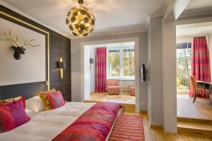 Postel nebo postele na pokoji v ubytování Parkhotel Adler