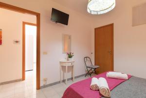 Postel nebo postele na pokoji v ubytování Casa Riviera