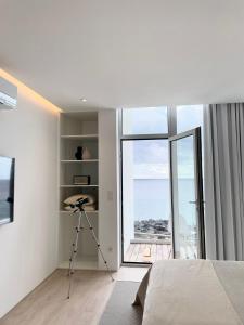 Televisyen dan/atau pusat hiburan di Barrocas Villas Azores