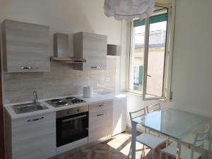 Kuchyňa alebo kuchynka v ubytovaní Salento vacanze