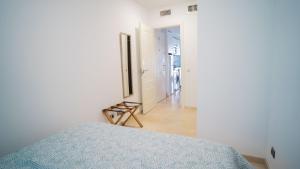 Łóżko lub łóżka w pokoju w obiekcie Apartamento Los Patos Beach