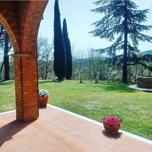 Vonkajšia záhrada v ubytovaní Villa Poggio fagianino