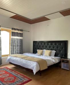Postel nebo postele na pokoji v ubytování Hotel Nubra Delight and Camps