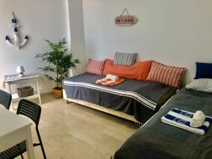 Posteľ alebo postele v izbe v ubytovaní Blue Sunrise Penthouse - Manilva
