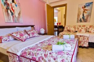Posteľ alebo postele v izbe v ubytovaní Angel Villa - Thassos Town