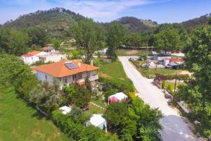 an aerial view of a house and a road at Angel Villa - Thassos Town in Limenas