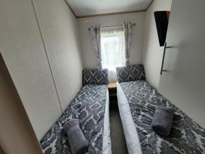 Fotografie z fotogalerie ubytování Lakeside Cotswold Holiday Home v destinaci Cirencester