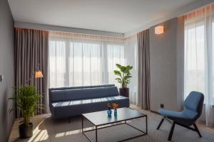 Posezení v ubytování Q Hotel Plus Wrocław Bielany