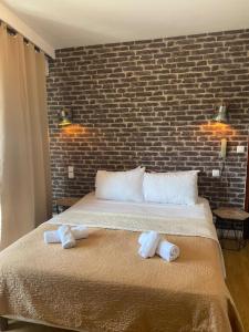 Ένα ή περισσότερα κρεβάτια σε δωμάτιο στο Resothel Le Gabian
