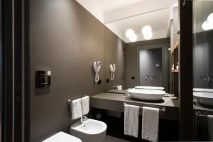 Koupelna v ubytování Re Sale Boutique Hotel