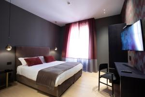Postel nebo postele na pokoji v ubytování Re Sale Boutique Hotel