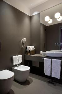 Koupelna v ubytování Re Sale Boutique Hotel