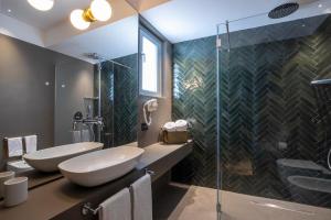 Koupelna v ubytování Re Sale Boutique Hotel
