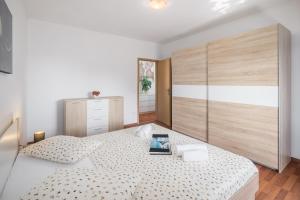 Posteľ alebo postele v izbe v ubytovaní Casa Viktoria with private garden and BBQ