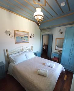A bed or beds in a room at Traditional Stone Villa Olympia