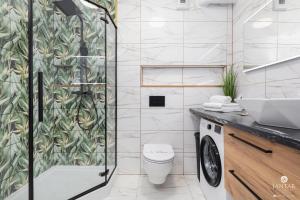 Kúpeľňa v ubytovaní Kasprowicza 20 Uzdrowisko by Jantar Apartamenty Kołobrzeg + 37 fotografií
