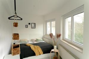 A bed or beds in a room at Familienapartment Reifnitz