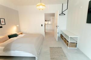 Postel nebo postele na pokoji v ubytování Familienapartment Reifnitz
